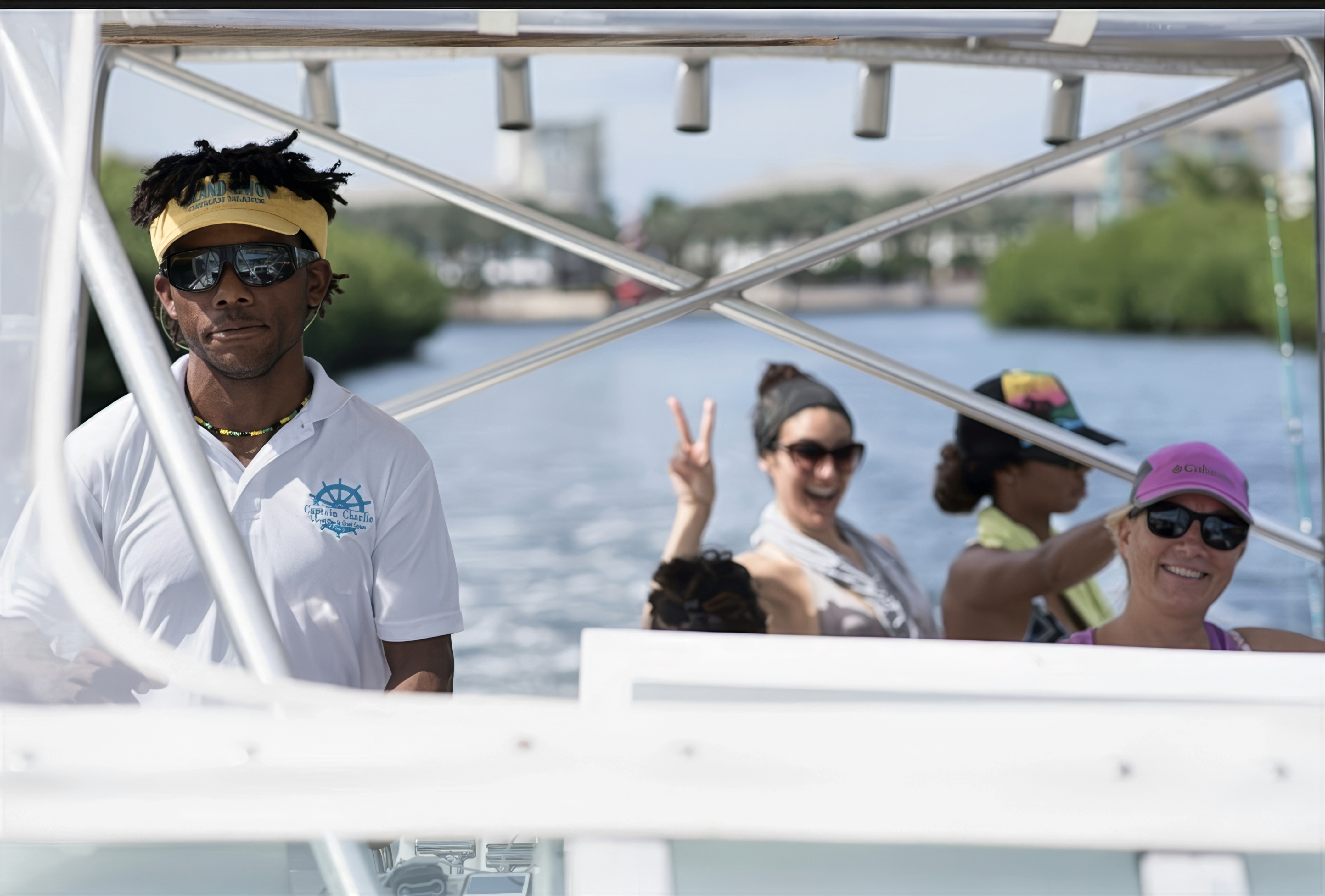 Captain Charlie and crew on boat